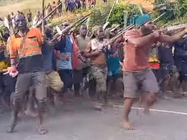 Tribal fighters in Papua New Guinea's Enga Province show of their strength, with many armed with machetes. Picture: Facebook