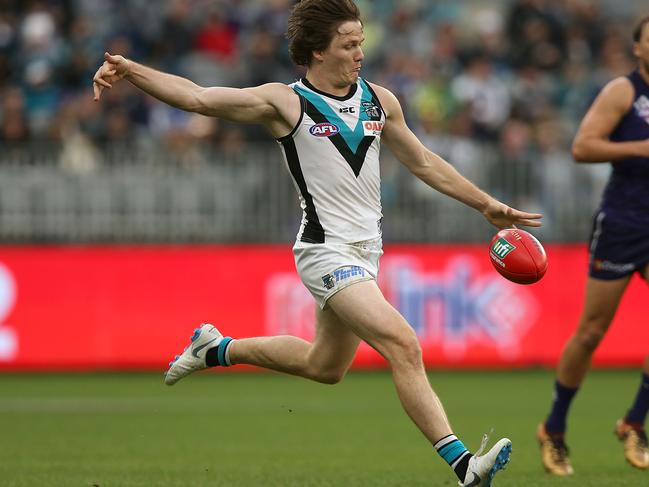 PERTH, AUSTRALIA - JULY 15: Jared Polec of the Power passes the ball during the round 17 AFL match between the Fremantle Dockers and the Port Adelaide Power at Optus Stadium on July 15, 2018 in Perth, Australia.  (Photo by Paul Kane/Getty Images)