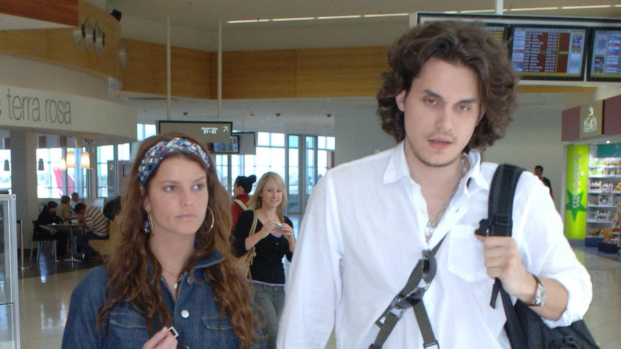 Singer Jessica Simpson with John Mayer at Adelaide airport.