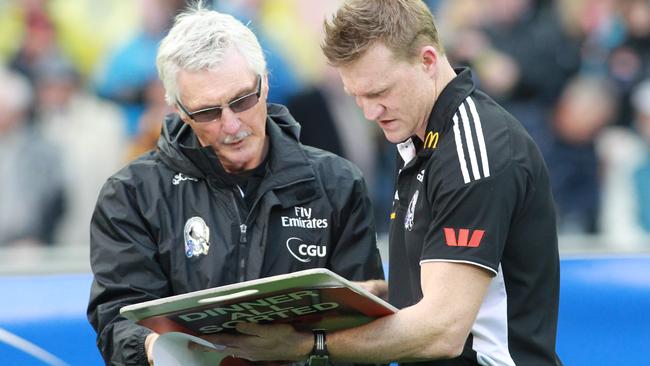 Mick Malthouse and Nathan Buckley work together during the 2011 season.