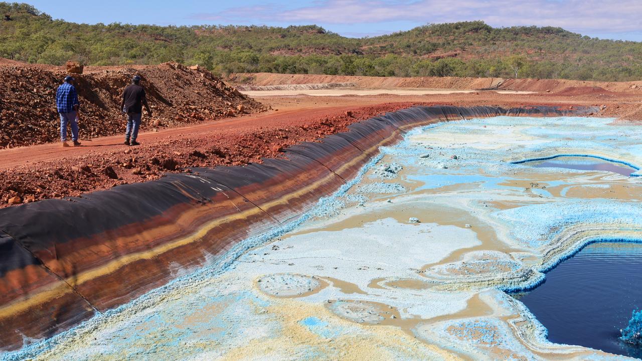 NLC Chair Matthew Ryan visits the old Redbank copper mine site with Traditional Custodian and Junggai Keith Rory to survey damage to Country, including leaking pits. Picture: Supplied/ Northern Land Council