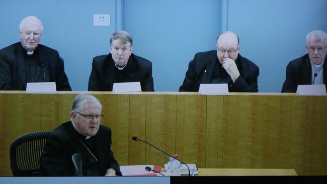 Archbishop Mark Coleridge, front, with, back from left, Archbishops Denis Hart, Anthony Fisher, Philip Wilson and Timothy Costelloe at the hearing in Sydney yesterday. Picture: DAVID MOIR / AAP