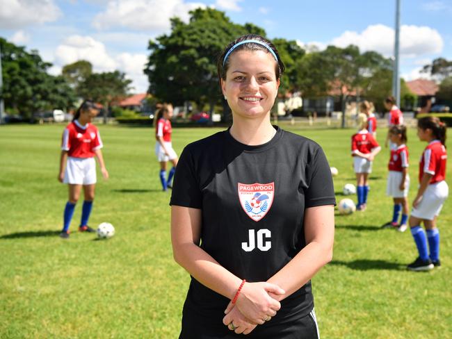 Pagewood Botany Football Club coach Julia Chernoukha poses for a photo at Jellicoe Park in Pagewood, Sydney, Saturday, Nov. 11, 2017. (AAP Image/Joel Carrett)