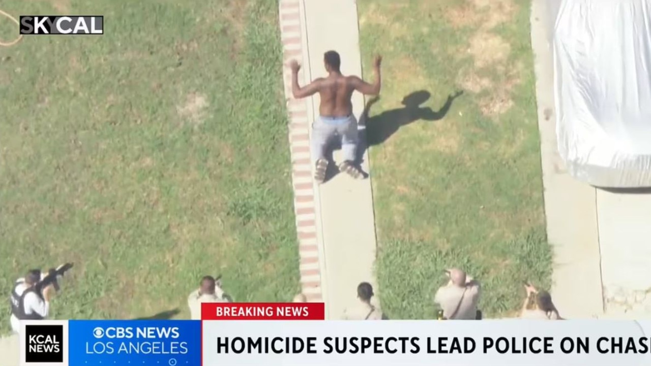 A witness said she has deep regret for not trying to help the McKays when they were set upon by two men. Pictured is one of the suspects surrounded by police. Picture: CBS News LA