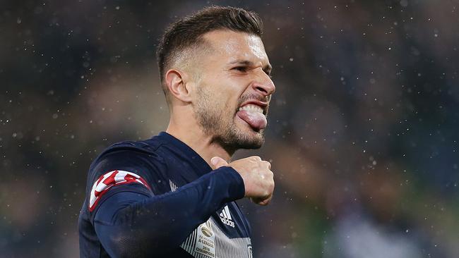 Kosta Barbarouses celebrates scoring for Melbourne Victory on Friday night. Picture: Getty Images