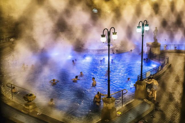 2014 National Geographic Photography Contest ... Places Winner Photo: “Bathing in Budapest”. The thermal spas in Budapest are one of the favorite activities of Hungarians, especially in winter. We were fortunate to gain special access to shoot in the thermal spa thanks to our tour guide, Gabor. I love the mist, caused by the great difference in temperature between the hot spa water and the atmosphere. It makes the entire spa experience more surreal and mystical. Location: Budapest, Hungary. Picture: Triston Yeo /National Geographic 2014 Photo Contest