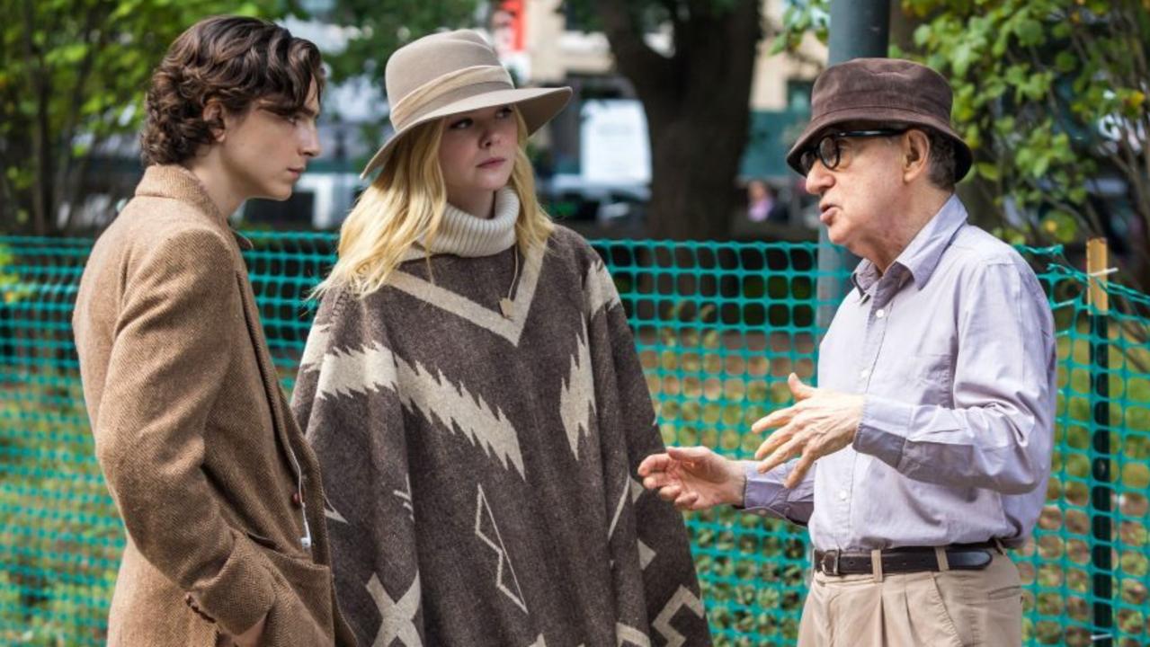 Timothée Chalamet, Elle Fanning and Woody Allen on the set of A Rainy Day in New York. Credit: Getty