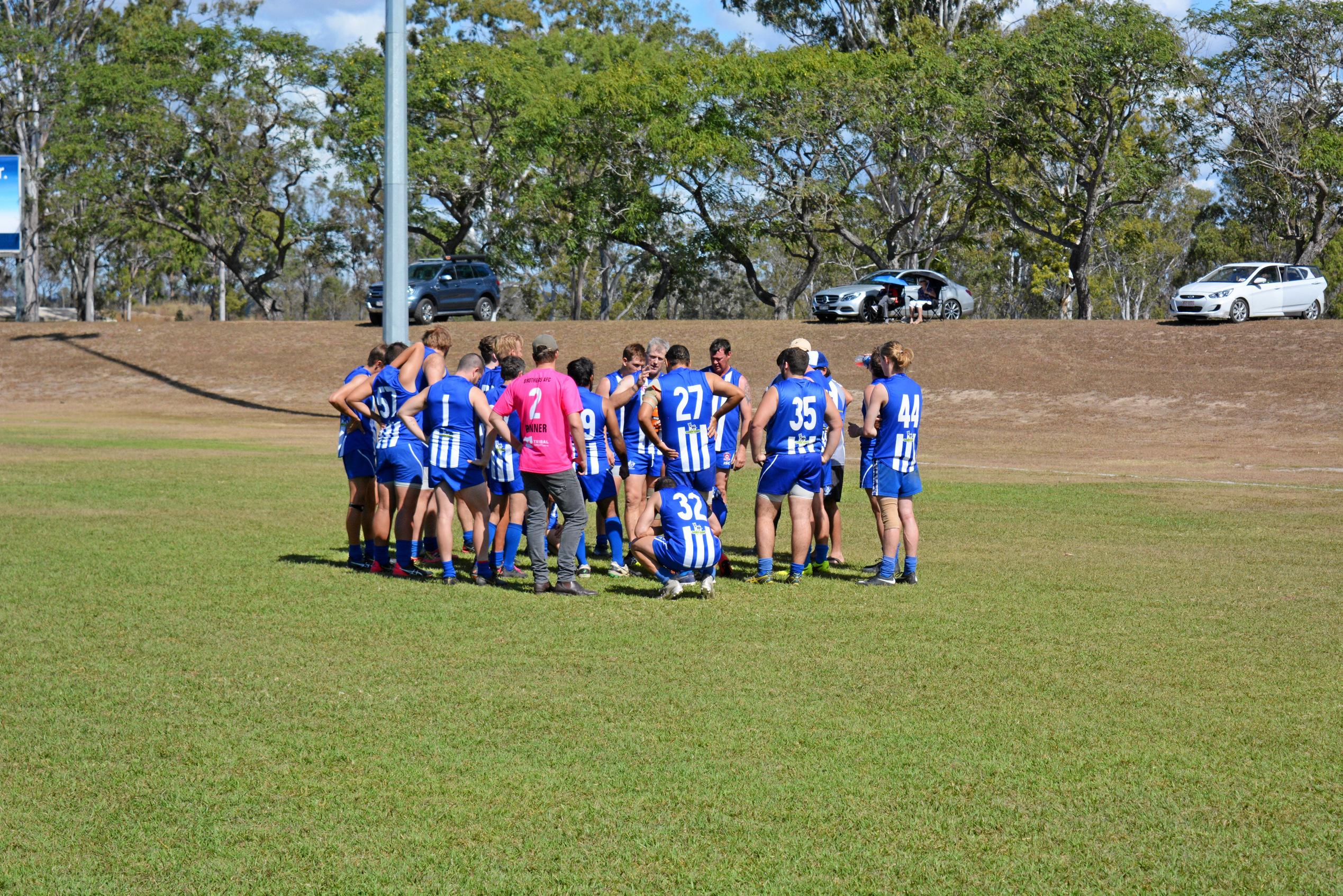 The Rocky Brothers huddle in the reserves. Picture: Nick Kossatch GLA040819BITSBROS
