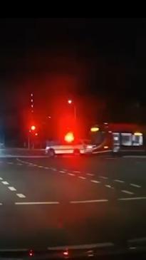 Shocking moment police car collides with Canberra light rail