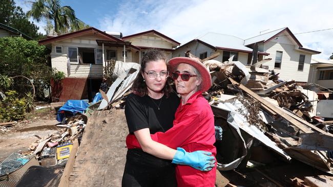 Marie Hainaut and daughter Helene at their Phyllis St home in South Lismore in the aftermath of the devastating floods. Photo: Jason O'Brien