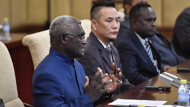 Prime Minister Sogavare meets with Chinese President Xi Jinping (not pictured) at the Diaoyutai State Guesthouse in 2019 in Beijing, China.