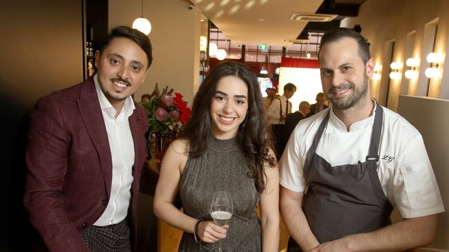 Head chef Luca Guiotto, right, with owners Natalie Fazzari and Alessandro Ennor, at the opening of Enoteca Lounge and Cucina on Rundle St. Picture Dean Martin