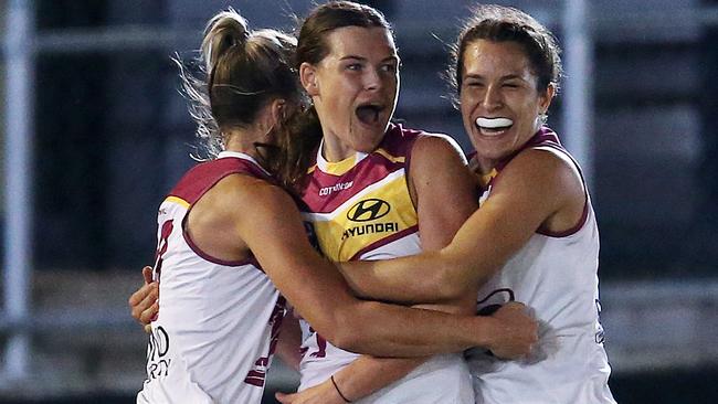 Brisbane’s Sophie Conway and Fremantle’s Emily McGuire share AFLW ...