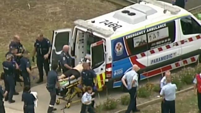 Tony Mokbel being worked on by paramedics at Barwon Prison Lara after being stabbed. Picture: Seven News