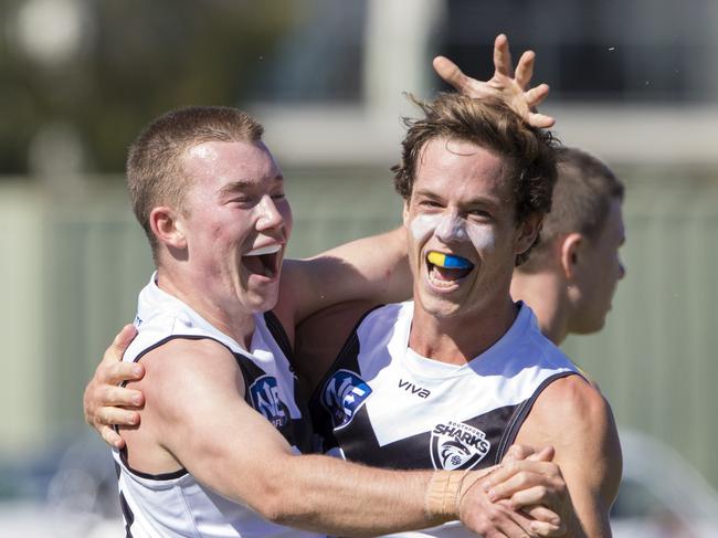 Kai Sheers (left) and Tom Wilkinson celebrates during Southport Sharks win over Canberra Demons at Fankhauser Reserve on Saturday, August 4, 2018. Picture credit: TJ Yelds, NEAFL.