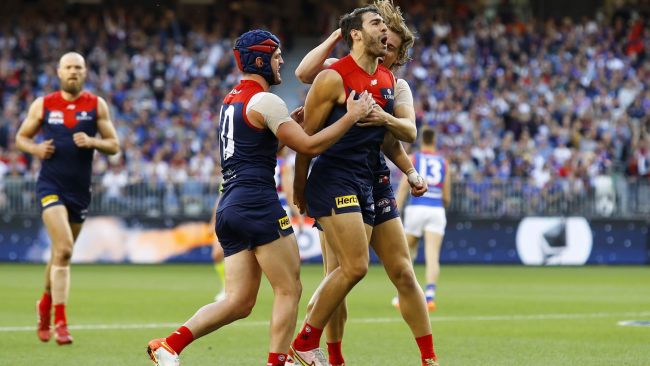 Christian Petracca celebrates a goal during the third term onslaught.