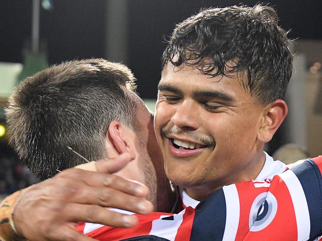 Latrell Mitchell and Luke Keary celebrate following their  win over the Storm in the NRL Preliminary Final match between the Sydney Roosters and Melbourne Storm at the SCG in Sydney, Saturday, September 28, 2019. (AAP Image/Dan Himbrechts) NO ARCHIVING, EDITORIAL USE ONLY