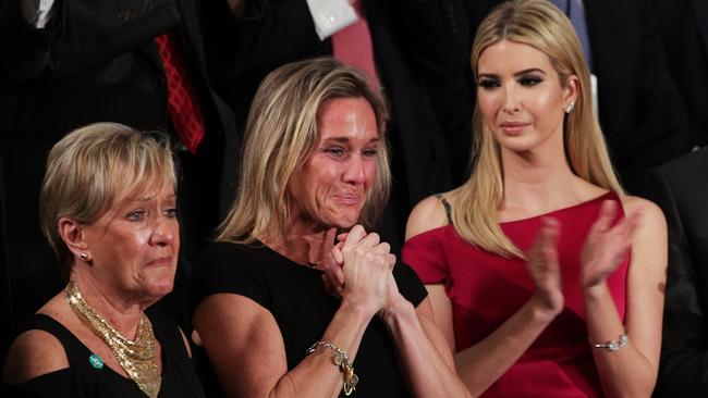 The widow of Fallen Navy Seal, Senior Chief William Owens, Carryn Owens, centre. Picture: Getty