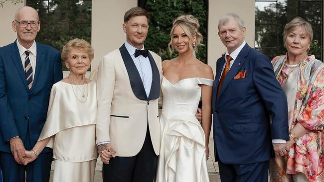 John Farnham and Jill (far left) with their son Rob and his wife Melissa and her parents.