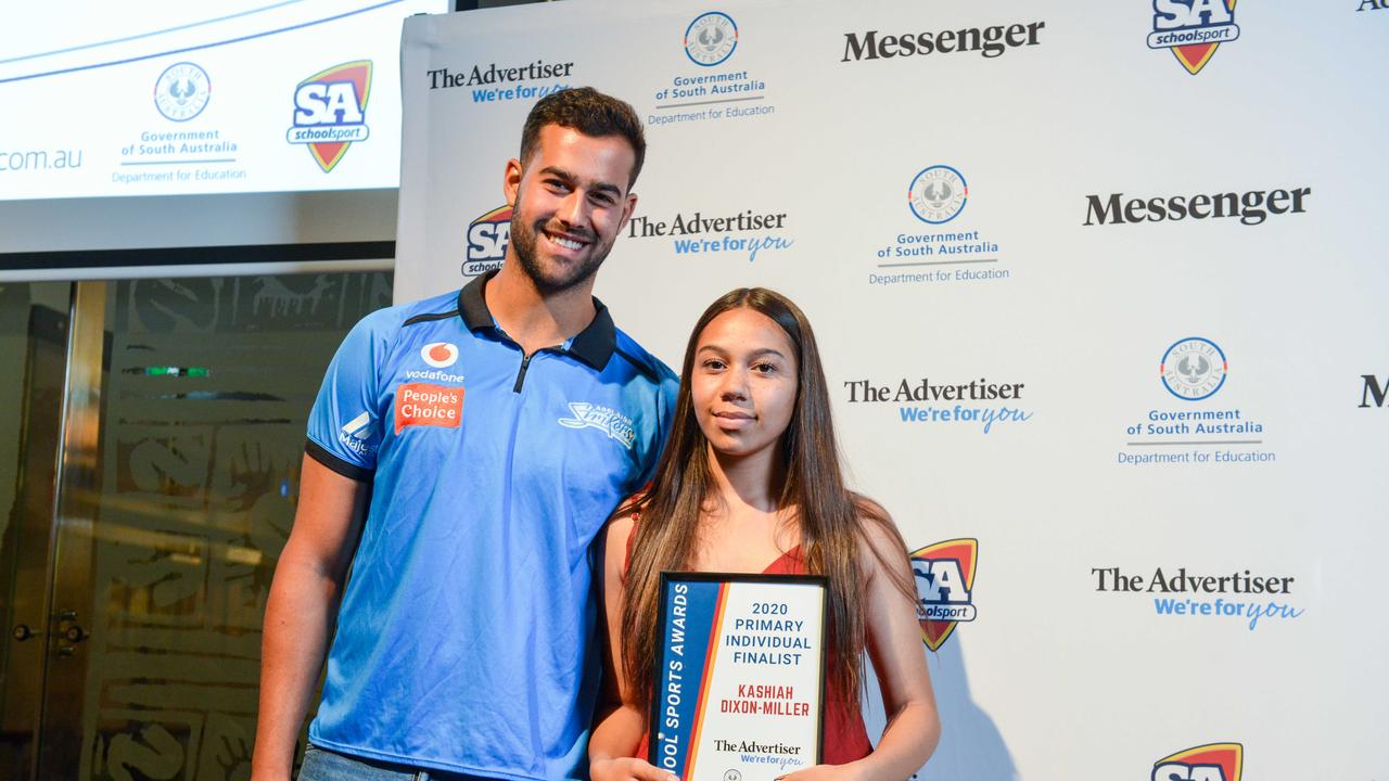 Cricketer Wes Agar with finalist Kashiah Dixon-Miller from LeFevre Peninsula Primary School at The School Sports Awards at the SA Museum. Picture: Brenton Edwards