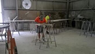 Two workers conducting dry cutting in a south east Queensland work site: Photo by WHSQ