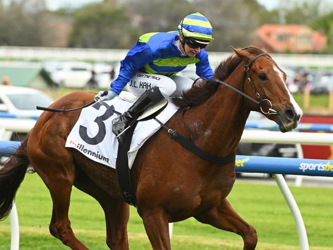 MELBOURNE, AUSTRALIA - SEPTEMBER 21: Jamie Kah riding Another Wil winning Race 5, the Millennium Testa Rossa Stakes - Betting Odds during Melbourne Racing at Caulfield Racecourse on September 21, 2024 in Melbourne, Australia. (Photo by Vince Caligiuri/Getty Images)