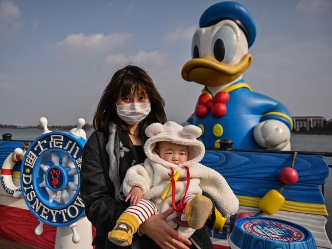 Shanghai Disney reopened its shopping and entertainment Disneytown zone in the "first step of a phased reopening", although the Disneyland amusement park remains closed. Picture: AFP