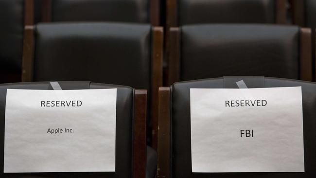 WASHINGTON, DC - MARCH 1: Seats are reserved for Apple and Federal Bureau of Investigations representatives prior to the start of a House Judiciary Committee hearing titled "The Encryption Tightrope: Balancing Americans' Security and Privacy," on Capitol Hill, March 1, 2016 in Washington, DC. Apple is fighting a court order requiring them to assist the FBI in opening the encrypted iPhone belonging to San Bernardino shooter Syed Farook. Drew Angerer/Getty Images/AFP == FOR NEWSPAPERS, INTERNET, TELCOS & TELEVISION USE ONLY ==