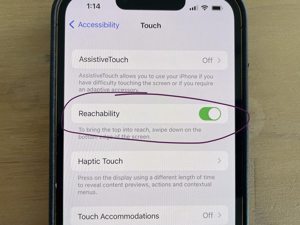 Reachability allows you to lower the top half of your screen.