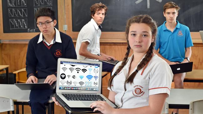 Central Coast Rudolf Steiner School students (front) Arabella Zocher and Cameron Wong, Mackenzie Platt and Reuben Ella-Kennedy struggle to get internet connection. Picture: Troy Snook