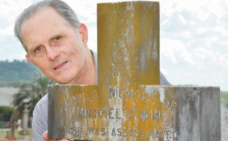 Peter Cullen stands near the grave of Michael Irwin at the Drayton Cemetery. Picture: Debbie Bruce