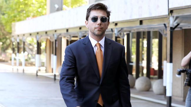 Journalist Joe Aston leaving Federal Court in the defamation trial against Elaine Stead. Picture: Jane Dempster