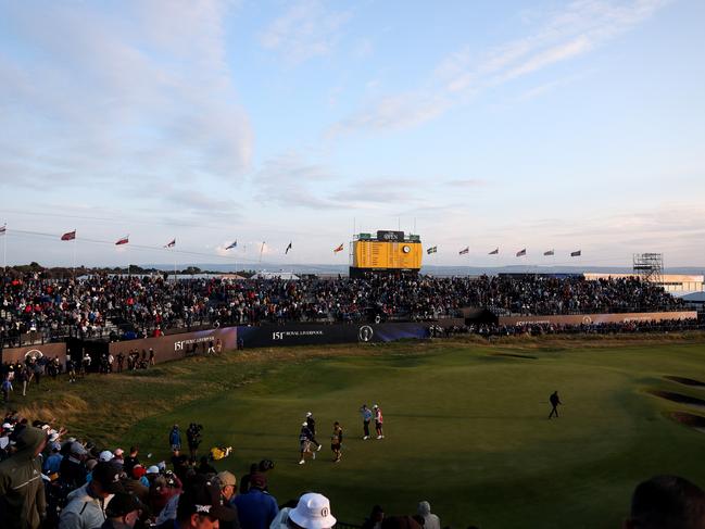 HOYLAKE, ENGLAND - JULY 20: Rory McIlroy of Northern Ireland walks on the 18th green on Day One of The 151st Open at Royal Liverpool Golf Club on July 20, 2023 in Hoylake, England. (Photo by Warren Little/Getty Images)