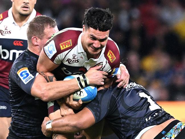 Hunter Paisami takes on the Hurricanes’ defence. Picture: Getty Images