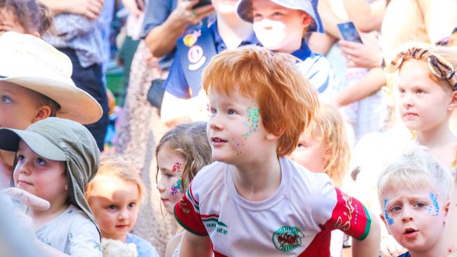 Reuben Stevens, 6, going off in the mini mosh pit at the Darwin Festival’s Teddy Bear’s Picnic on the Esplanade. Picture: Glenn Campbell