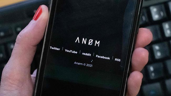 (FILES) An illustration picture shows the ANoM logo displayed on the screen of an smartphone on June 8, 2021 in Paris. The US offered a $5 million reward on June 7, 2023, for the Swedish man who marketed an encrypted communications network for drug traffickers -- unaware that the technology was developed by the FBI. The State Department posted the hefty reward for Maximilian Rivkin, who has escaped arrest since the 2021 takedown of the ANOM network. (Photo by Olivier MORIN / AFP)