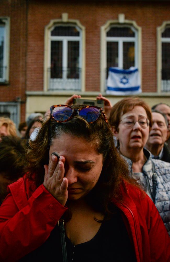 A woman cries during the gathering in support of Israel in front of Israel's embassy in Brussels. Picture: Laia Ros/Getty Images