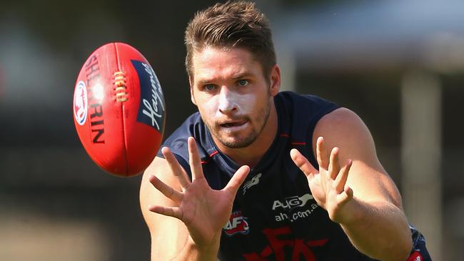 MELBOURNE, AUSTRALIA - FEBRUARY 23: Jesse Hogan of the Demons marks during a Melbourne Demons AFL training session at AAMI Park on February 23, 2016 in Melbourne, Australia. (Photo by Quinn Rooney/Getty Images)
