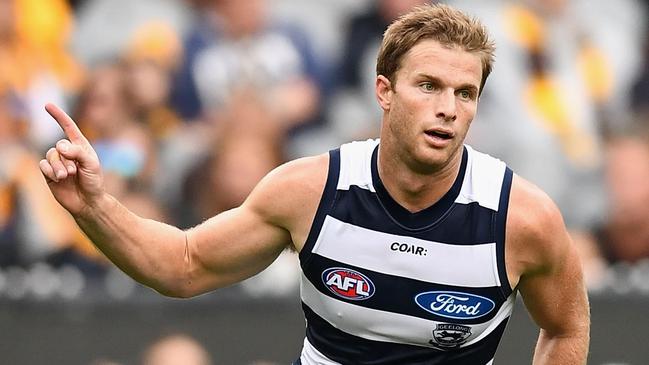 Lachie Henderson celebrates kicking a goal for Geelong in 2017. Picture: Quinn Rooney/Getty Images.