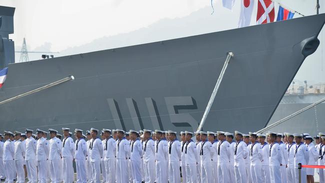 Taiwan sailors parade in front of the 'Feng Chia' navy frigate. Picture: AFP.