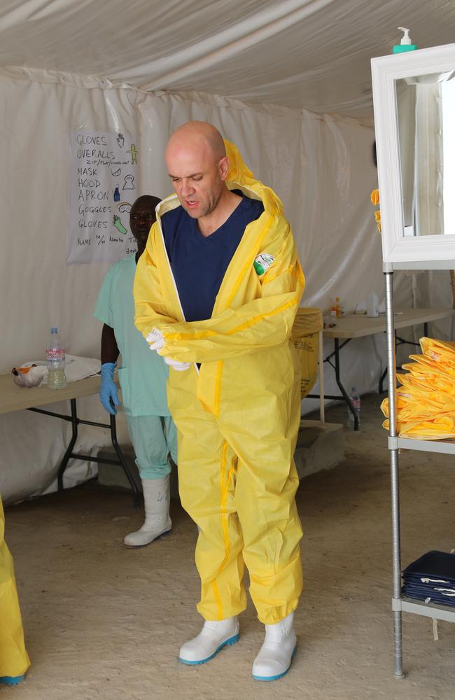 Dr John Gerrard in his protective equipment in Africa during a posting for an Ebola outbreak.