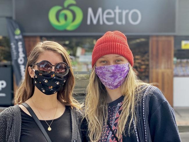 SYDNEY, AUSTRALIA -AUGUST 03 2020:  Shoppers at Marrickville Metro Woolworths in Sydney's Inner West donned face masks after the supermarket "strongly encouraged" customers and staff to cover up. Pictured is Caylin (left) and Isla (right).  Picture: NCA NewsWire / Hannah Moore