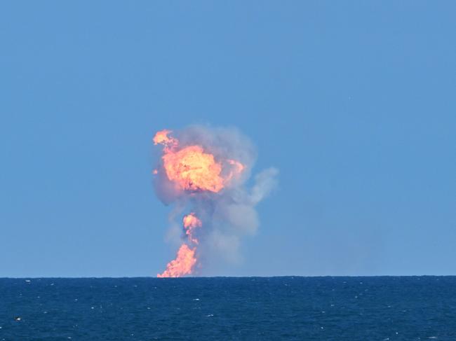 Starship's Super Heavy Booster splashes down for a water landing off the coast of, Texas. Picture: AFP