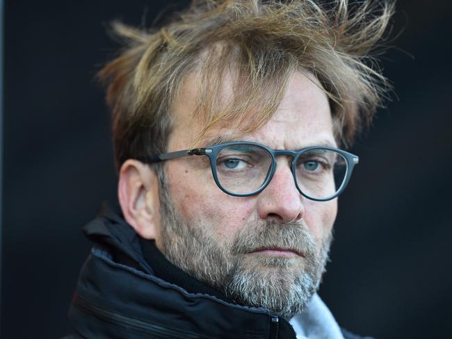 Liverpool's German manager Jurgen Klopp looks on ahead of the English Premier League football match between Bournemouth and Liverpool at the Vitality Stadium in Bournemouth, southern England on December 4, 2016. / AFP PHOTO / Glyn KIRK / RESTRICTED TO EDITORIAL USE. No use with unauthorized audio, video, data, fixture lists, club/league logos or 'live' services. Online in-match use limited to 75 images, no video emulation. No use in betting, games or single club/league/player publications. /