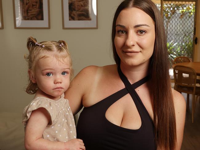 Monique Robinson, 28 with daughter Alirah, 1, at home in Shailer Park. Picture: Liam Kidston