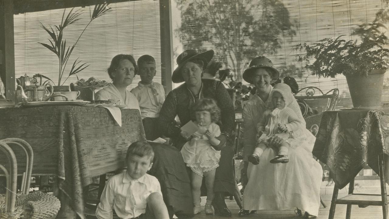 Women and children having tea on the veranda of a Queenslander house, ca. 1900. Source: State Library of Queensland.