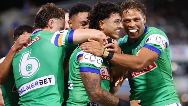 CANBERRA, AUSTRALIA - APRIL 07: Xavier Savage of the Raiders celebrates scoring a try with team mates during the round five NRL match between Canberra Raiders and Parramatta Eels at GIO Stadium, on April 07, 2024, in Canberra, Australia. (Photo by Mark Nolan/Getty Images)