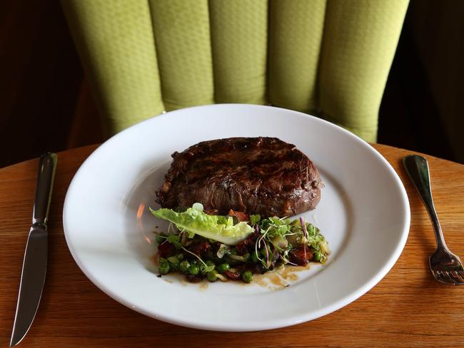 350g rib fillet with braised peas and smoked bacon at the Story Bridge Hotel.