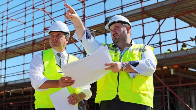 Federal Member for Cowper Pat Conaghan with Bachrach Naumburger Group General Manager Steve Gooley, inspecting work on the company's $150 million Park Beach development The Shoreline today. Picture: Frank Redward