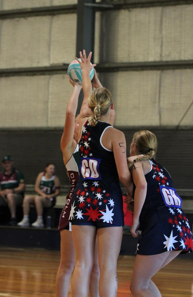 Netball action from QISSN 2024, Townsville. Chisholm Catholic College Cornubia v Aquinas College Ashmore